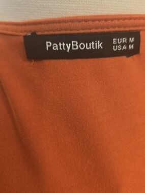 PattyBoutik Sleeveless V-Neck Rust Orange Tank Top. Hand Tailored